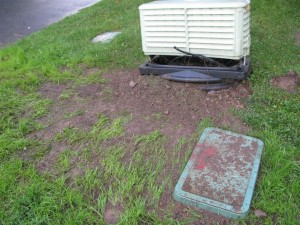 The fiber-optic head end on my front lawn, the Verizon FiOS vault in the foreground.