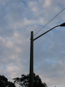 Lamp post with coaxial cable tied on